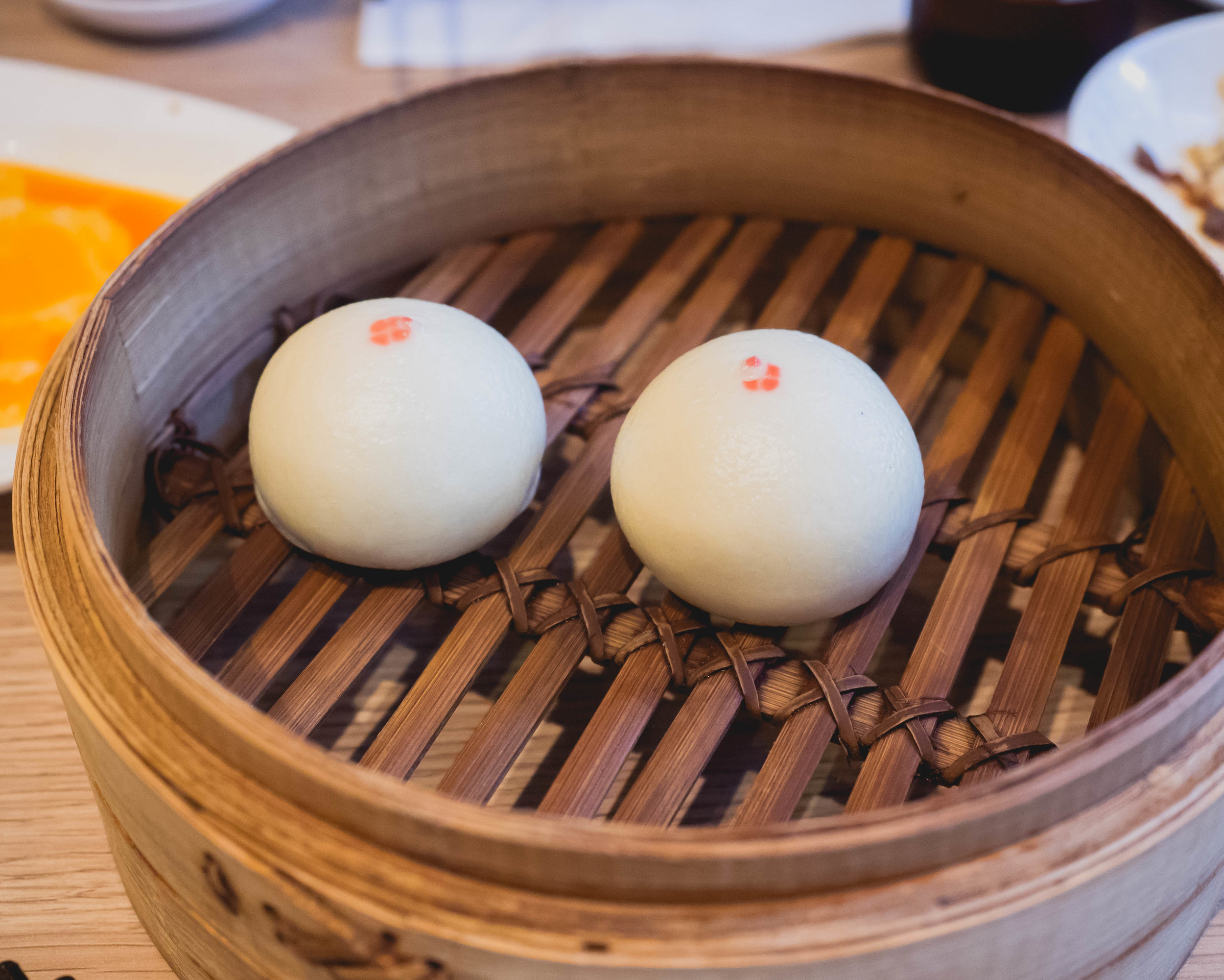 steamed mini red bean buns .