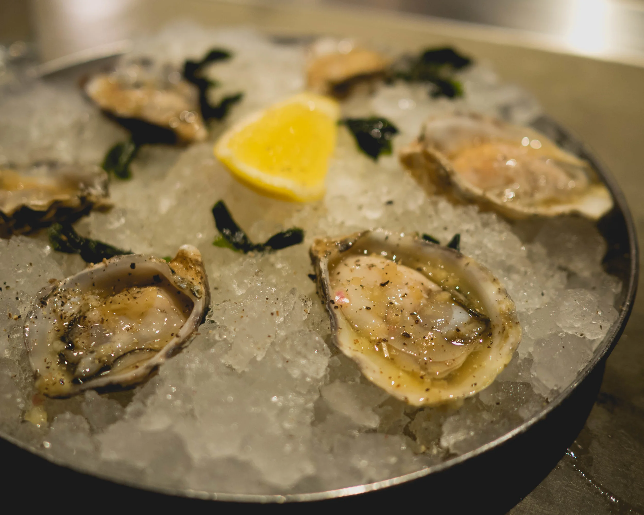 oysters , dashi mignonette, shallot, lemon.