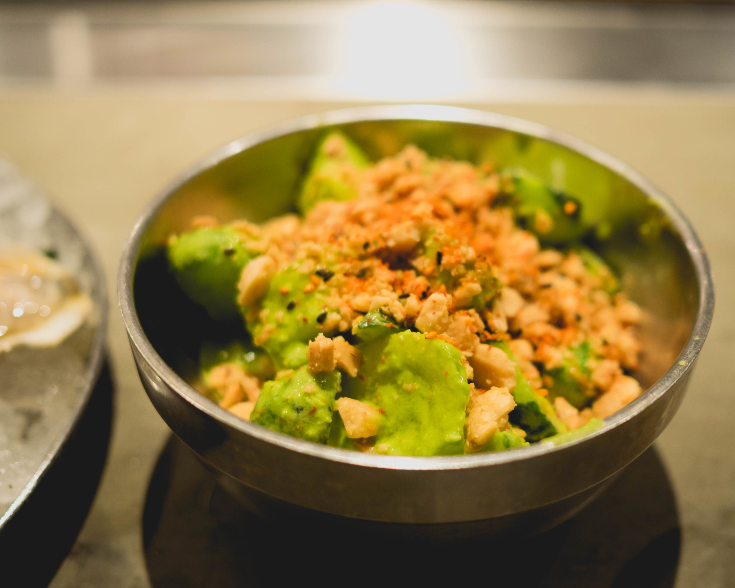 spicy cucumbers , togarashi, toasted almonds.