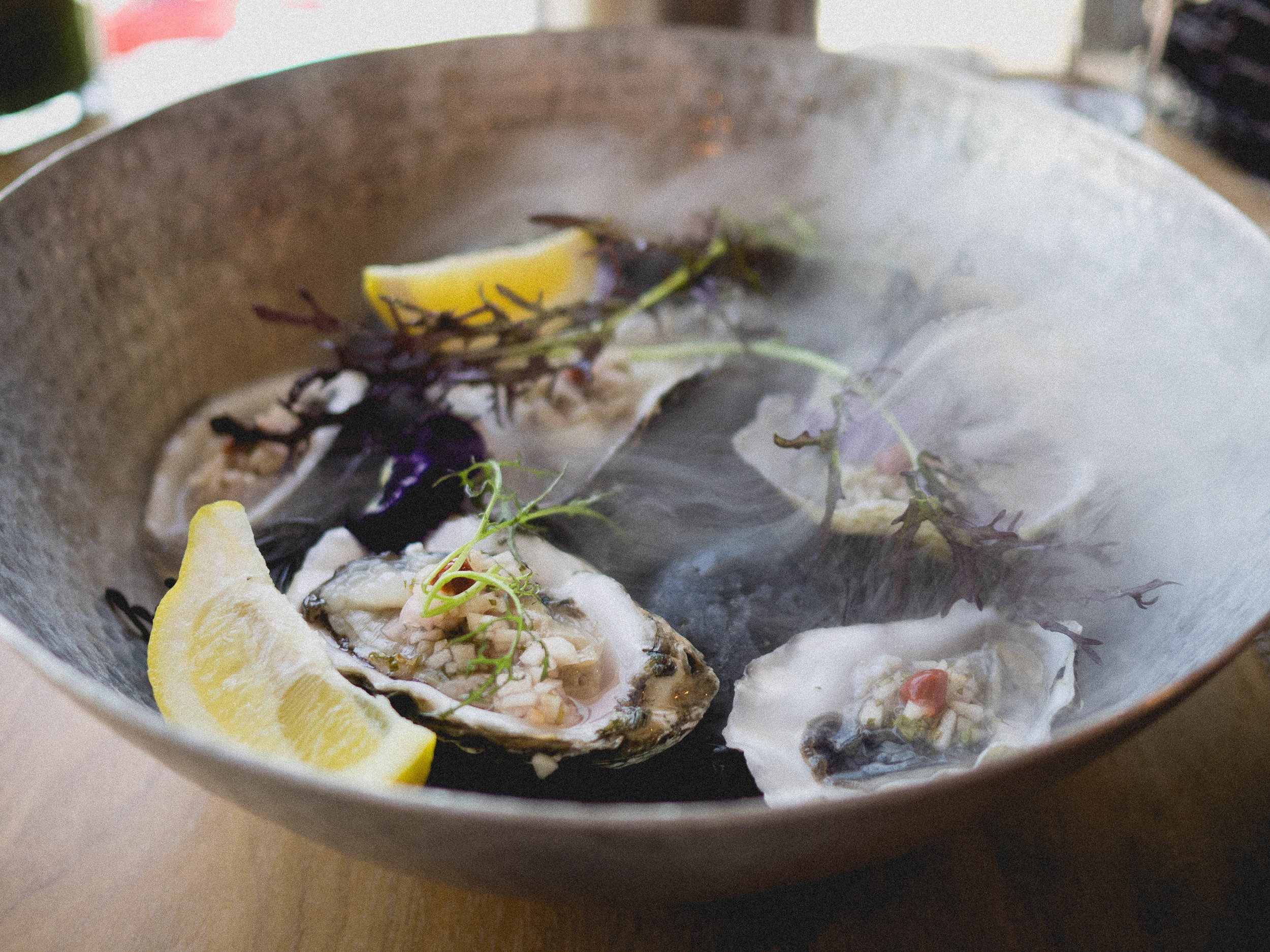 seasonal oysters , apple cider mignonette, 917 hot sauce.