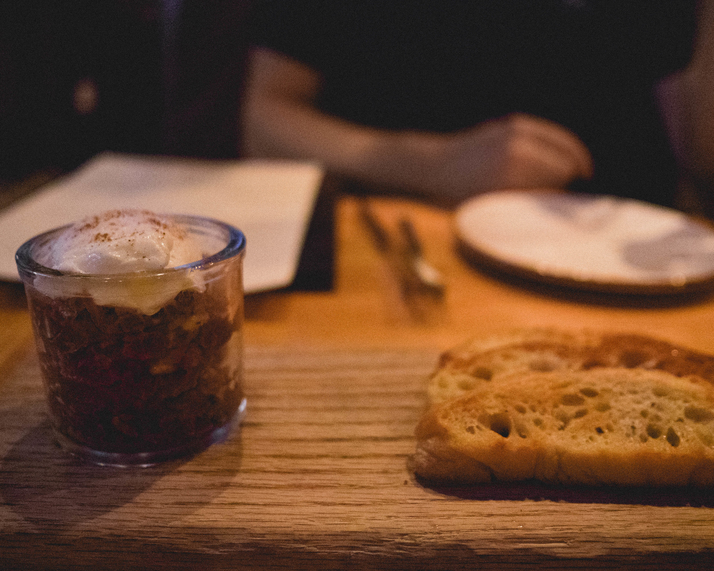 steak tartare , shallots, pine nuts, soft egg, chile vin, truffle oil.