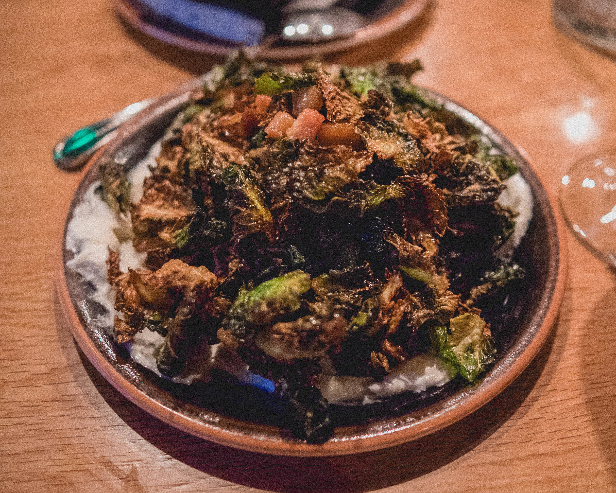 brussels , cider gastrique, slab bacon, goat cheese.