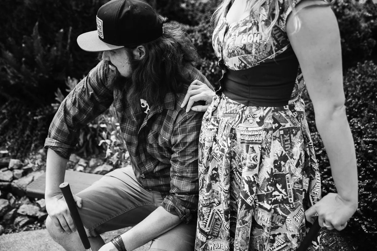 Couple connecting during game of mini golf Castle Fun Park Documentary Engagement Photography, minigolf date by Mimsical Photography. Real stories about Real Couples that are just as unique as they are. #unique #vibrant #personality #nerd #princess #ecclectic #gamer #couple #minigolf #vancouver #candid #storytelling #connect #datesforcouples #arcade #arcadedate