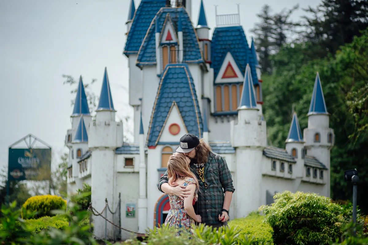 Castle Kiss, romantic date, Feeling like a princess Castle Fun Park Documentary Engagement Photography, minigolf date by Mimsical Photography. Real stories about Real Couples that are just as unique as they are. #unique #vibrant #personality #nerd #princess #ecclectic #gamer #couple #minigolf #vancouver #candid #storytelling #connect #datesforcouples #arcade #arcadedate