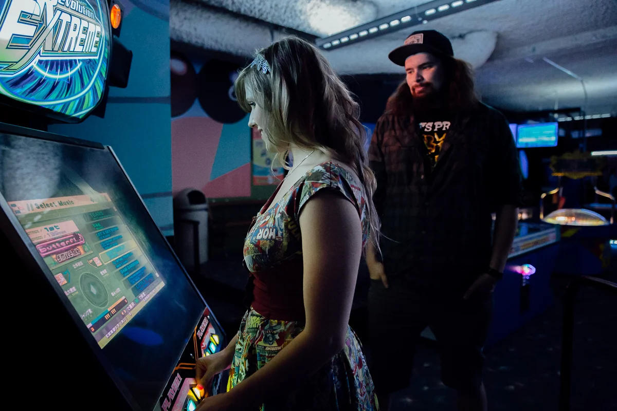 dance dance Revolution arcade game challenge Castle Fun Park Documentary Engagement Photography, minigolf date by Mimsical Photography. Real stories about Real Couples that are just as unique as they are. #unique #vibrant #personality #nerd #princess #ecclectic #gamer #couple #minigolf #vancouver #candid #storytelling #connect #datesforcouples #arcade #arcadedate