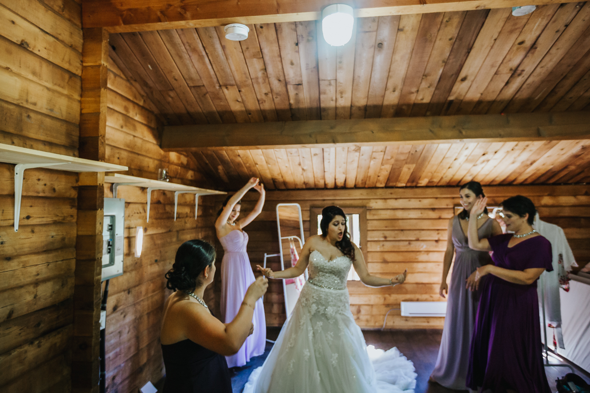 bride is dressed dance party Mimsical Photography Documentary Wedding Photography, Camp Howdy, Belcarra Provincial Park, North Vancouver. Purple and Grey Wedding Colours, Natural Greenery, Rustic Details, Summer, Lace and chiffon, big wedding, greek, lower mainland, british columbia, real, genuine, candid