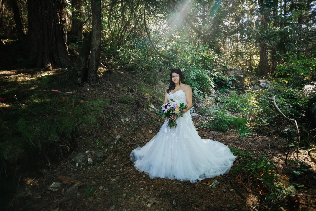 Bride in BC forest green - pruple and white accents Mimsical Photography Documentary Wedding Photography, Camp Howdy, Belcarra Provincial Park, North Vancouver. Purple and Grey Wedding Colours, Natural Greenery, Rustic Details, Summer, Lace and chiffon, big wedding, greek, lower mainland, british columbia, real, genuine, candid