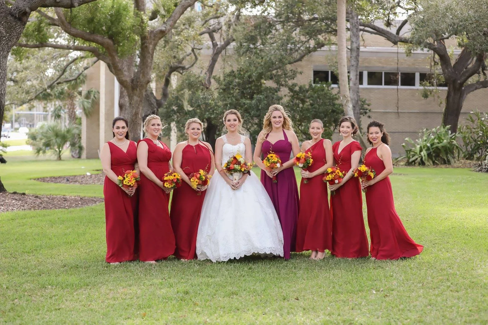 Bridesmaids wore dresses in bright fall shades which accented the colors found throughout the wedding.