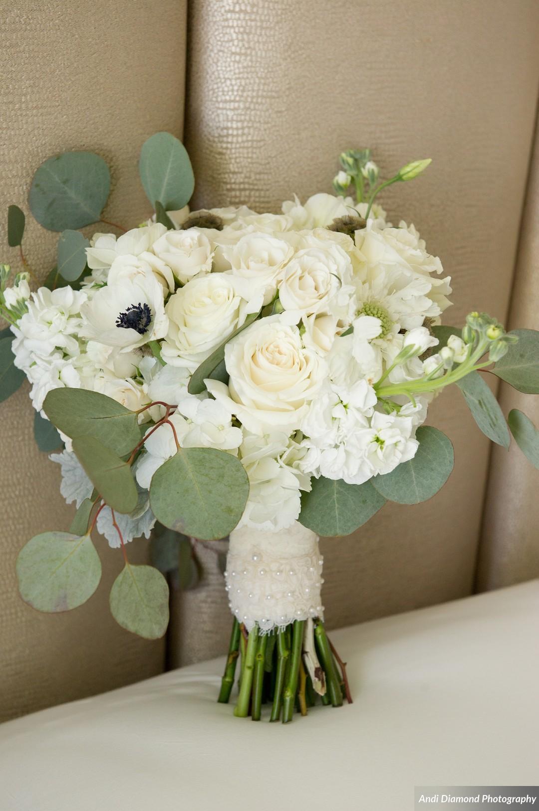 The bride’s bouquet consisted of roses, hydrangea, anemones, lisianthus (in honor of the bride ‘Liz’), and eucalyptus.