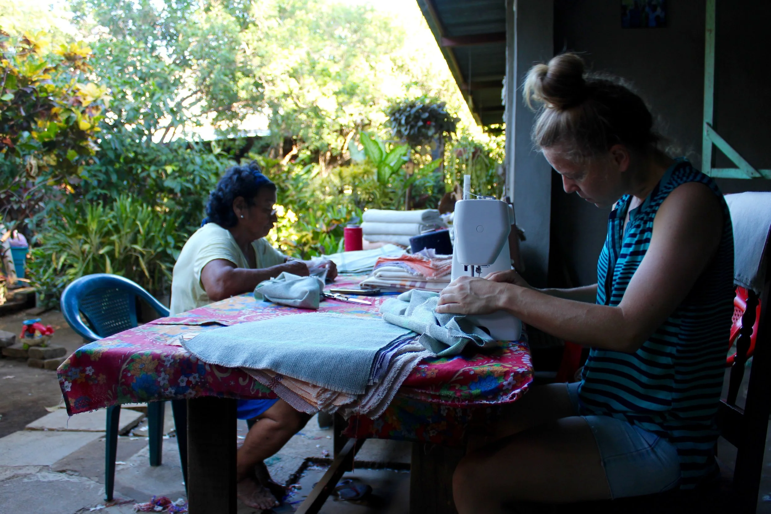 Founder Amanda with partner artisans in Nicaragua working on new designs and finishing techniques. 