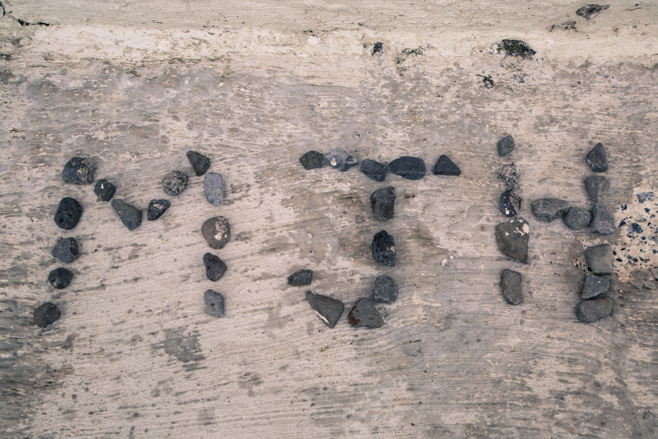 "... made our initials with surrounding rocks and placed them at the lighthouse...