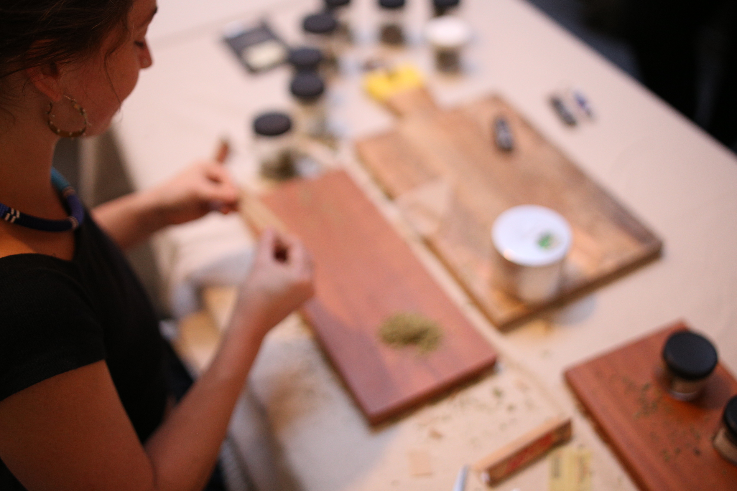Gabrielle, a TJ's budtender, rolls joints at Make & Mary.