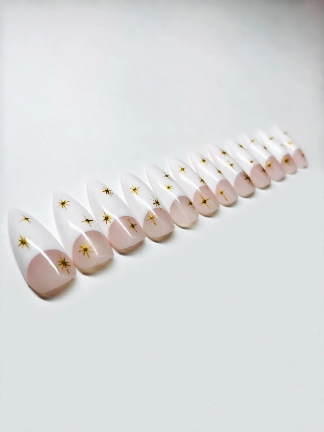 White French with Stars Apres Gel-X Press Ons (Stiletto Medium)