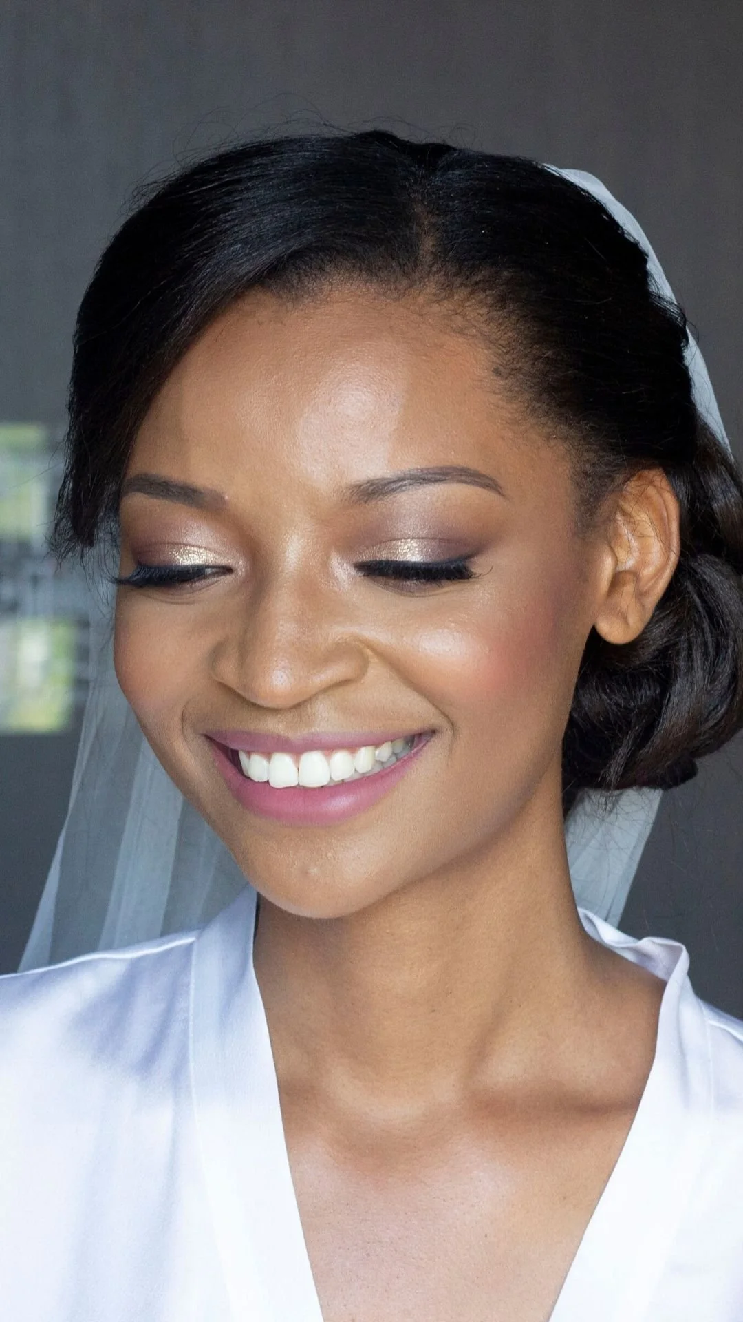 Black bride wearing beautiful natural makeup in Ottawa