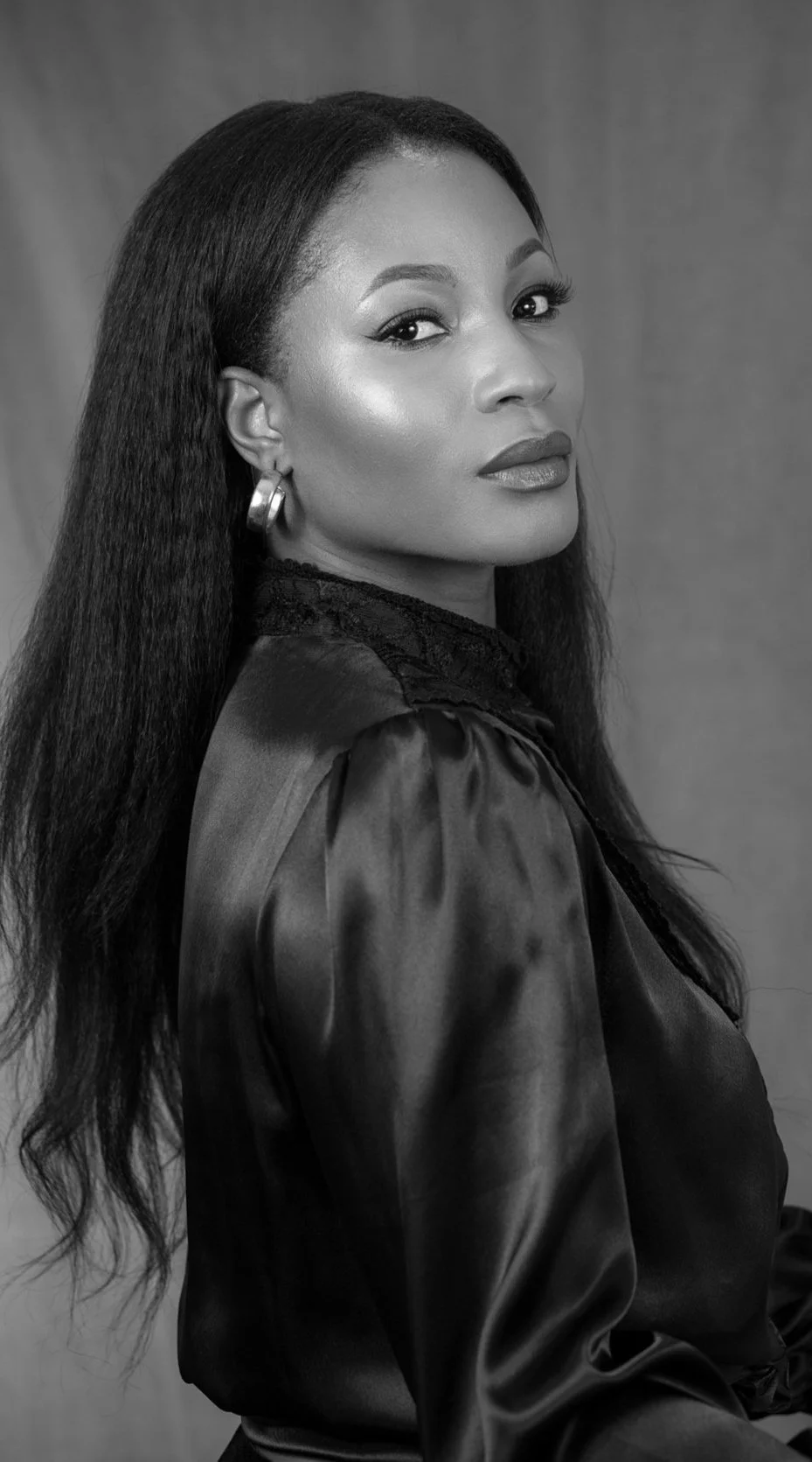 Black women with flawless makeup looking camera ready for branding photoshoot in Ottawa