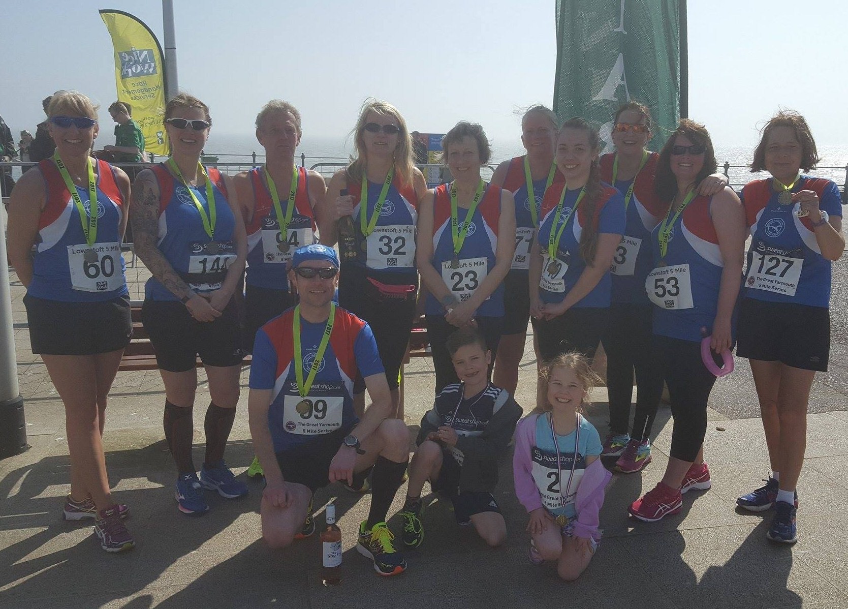 GYRR post race team shot with team mascots Noah and Darcy.