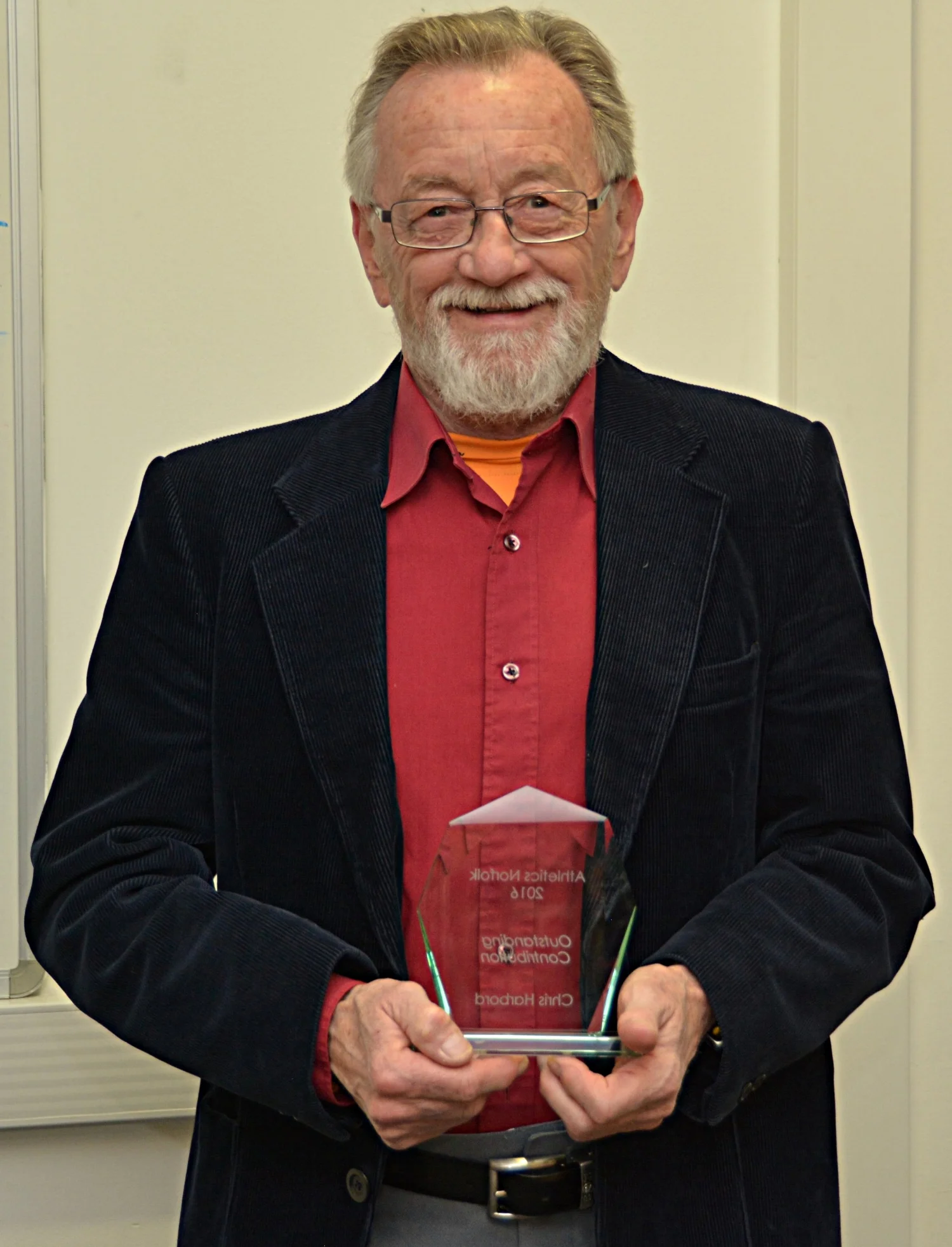Chris Harbord collecting his Outstanding Contribution award.