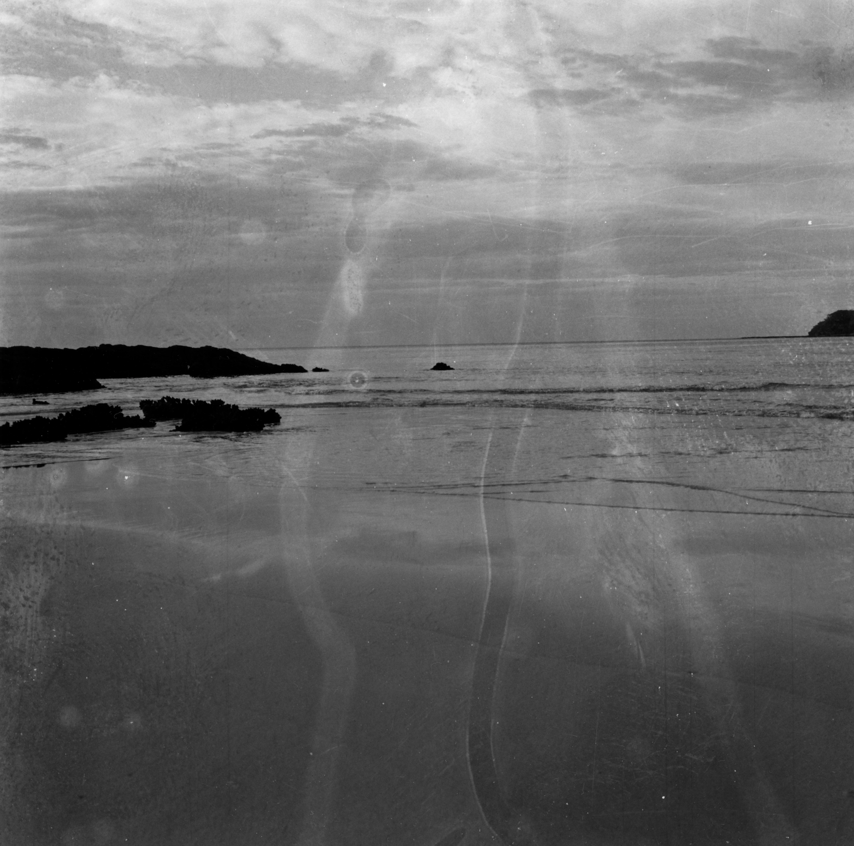 Broulee [Salt Sketch] - Darkroom Version 6x6 photographic negative processed with ocean water collected from site. photograph hand-developed by artist on Multigrade FB.