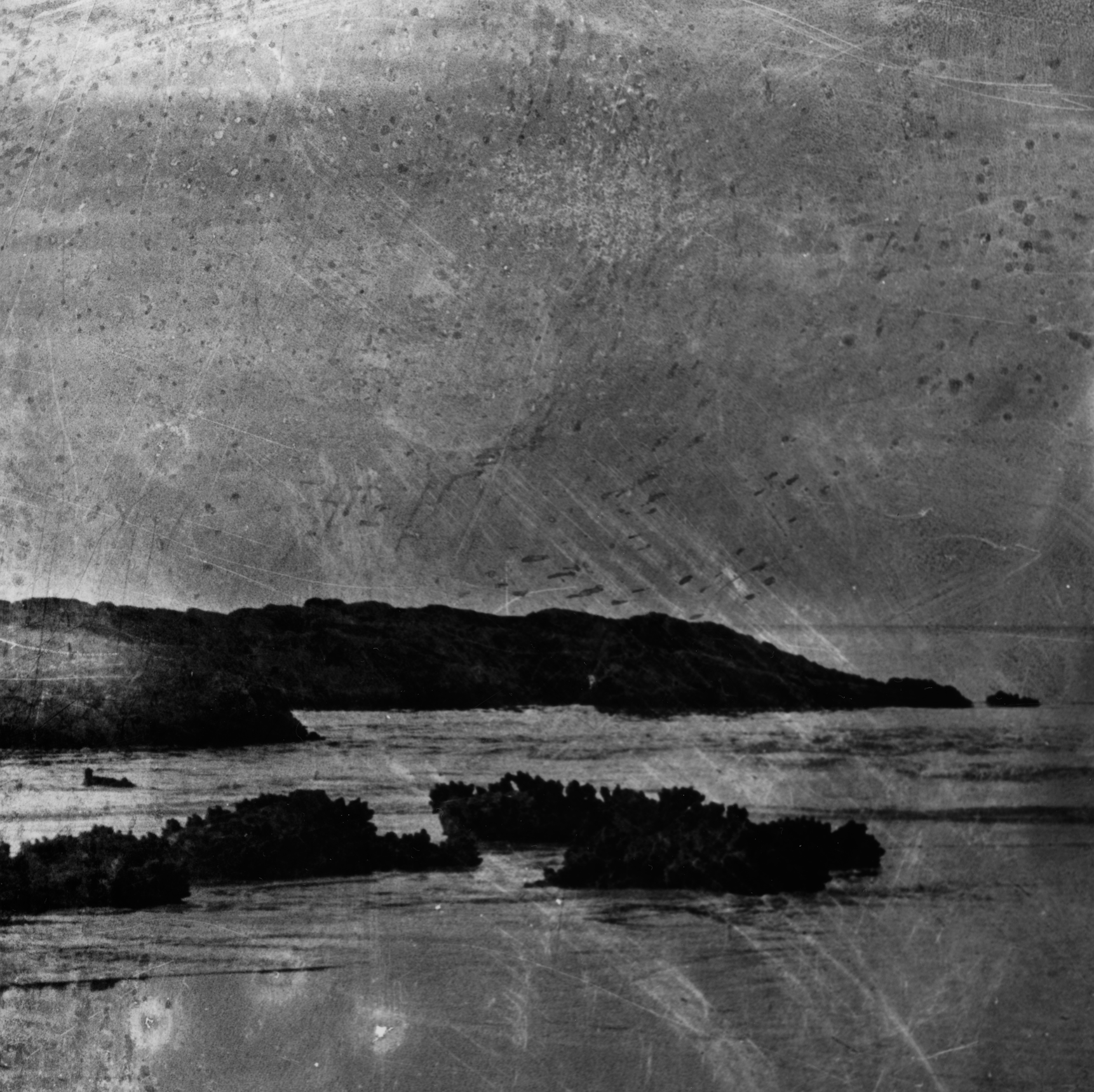 Detail 3 6x6 photographic negative processed with ocean water. photograph hand-developed by artist on Multigrade FB.