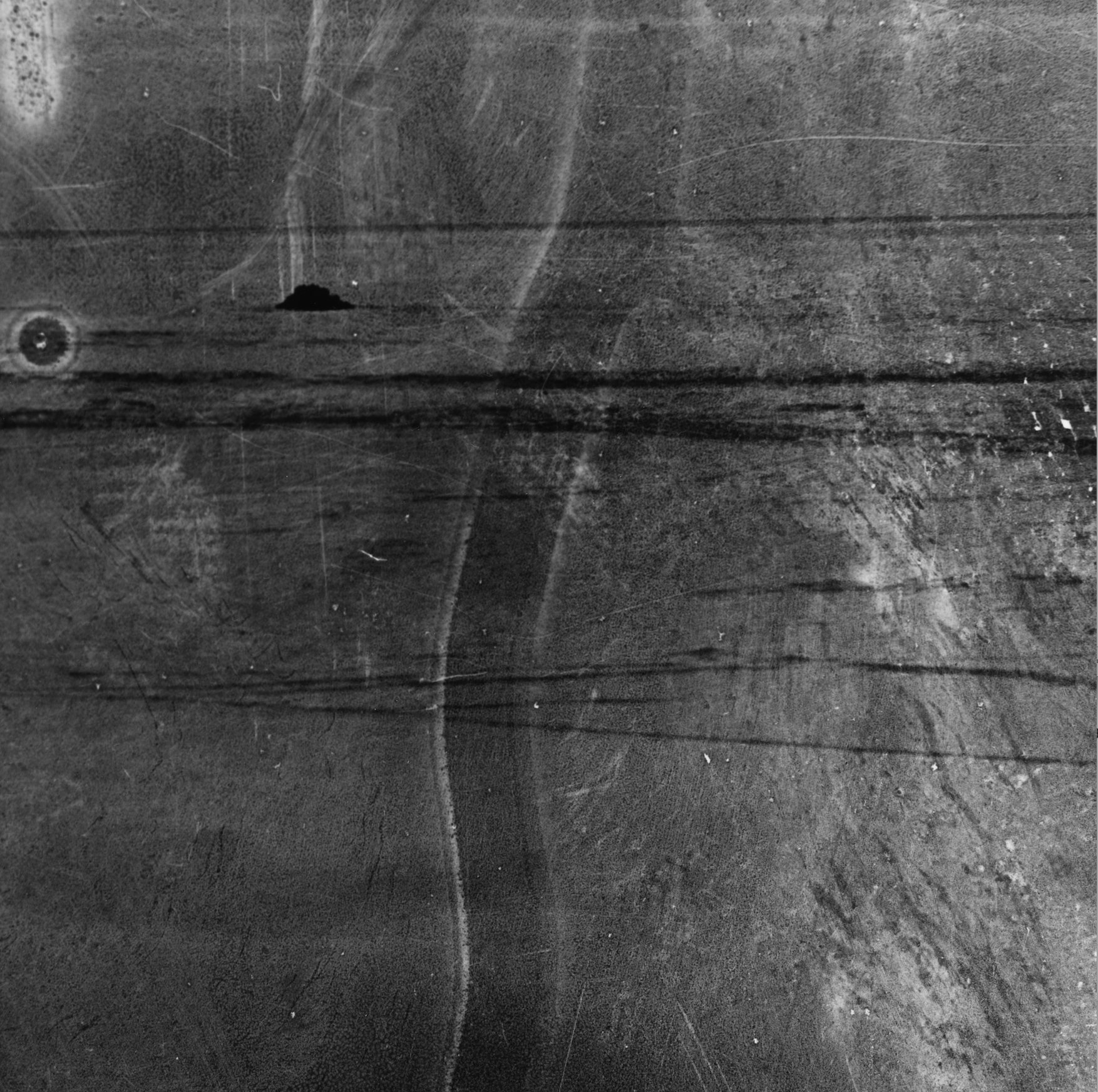 Detail 2 6x6 photographic negative processed with ocean water. photograph hand-developed by artist on Multigrade FB.