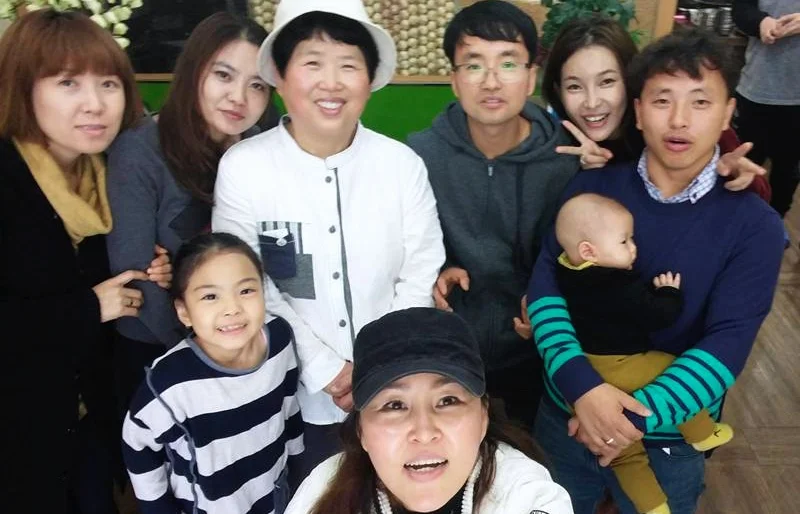 Pictured above in white and a white hat is President Ham of Ham Company and Restaurant; In blue is Program Director of Arirang Institute, John Lee