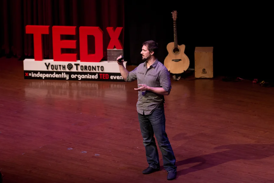 Todd speaking about challenges at TEDxYouth Toronto (Photo Credit TEDxYouth Toronto).
