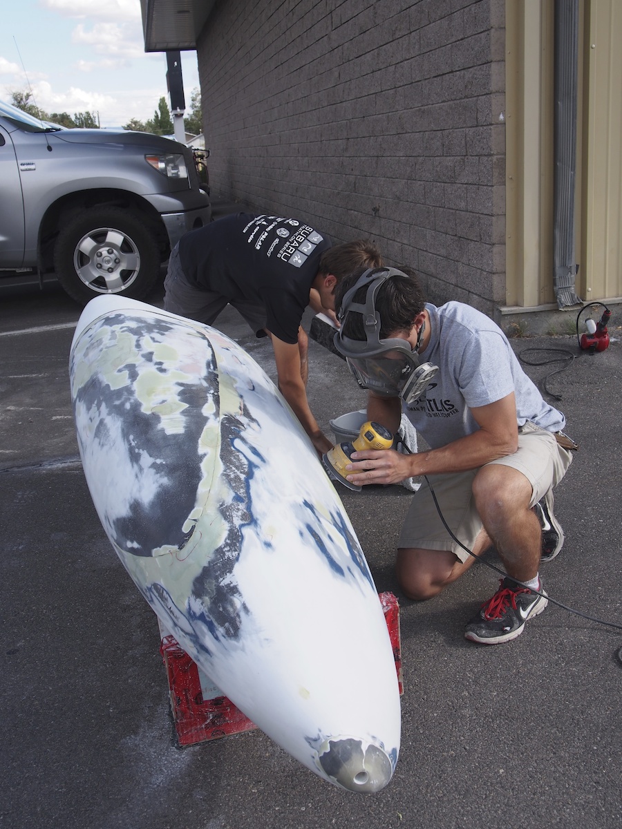 Alex and Trefor continue fairing Bluenose (Photo by Jun Nogami).