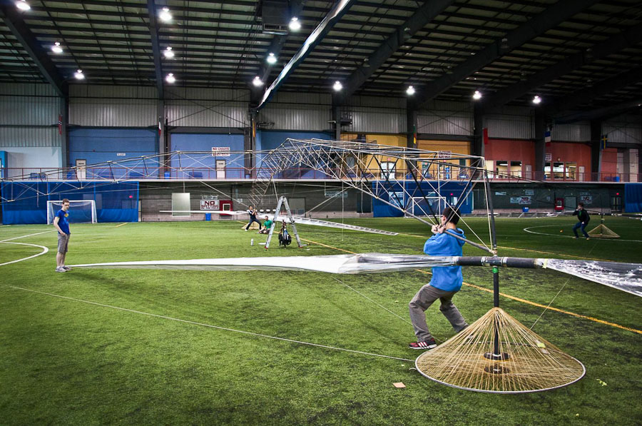 The team load testing the structure and making the final adjustments to the external bracing lines.