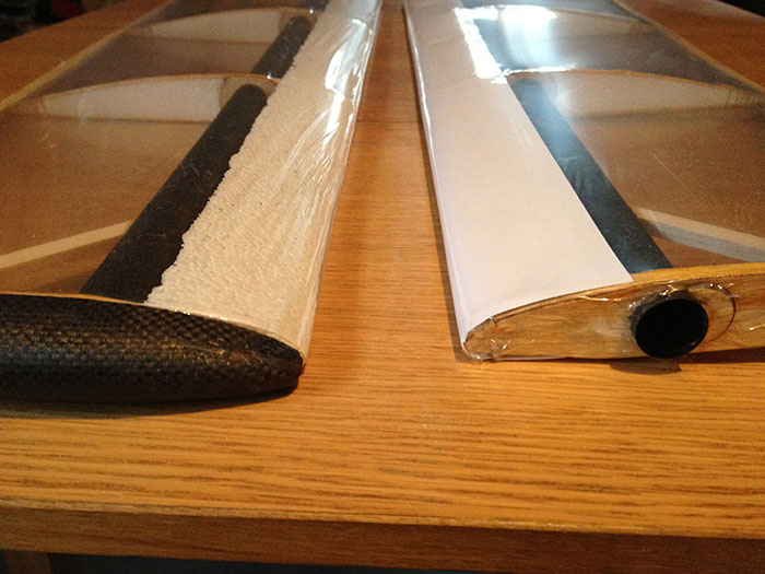 Side-by-side comparison of revised leading-edge on the canards, on left with smoothed polystyrene and on the right with paper surface.