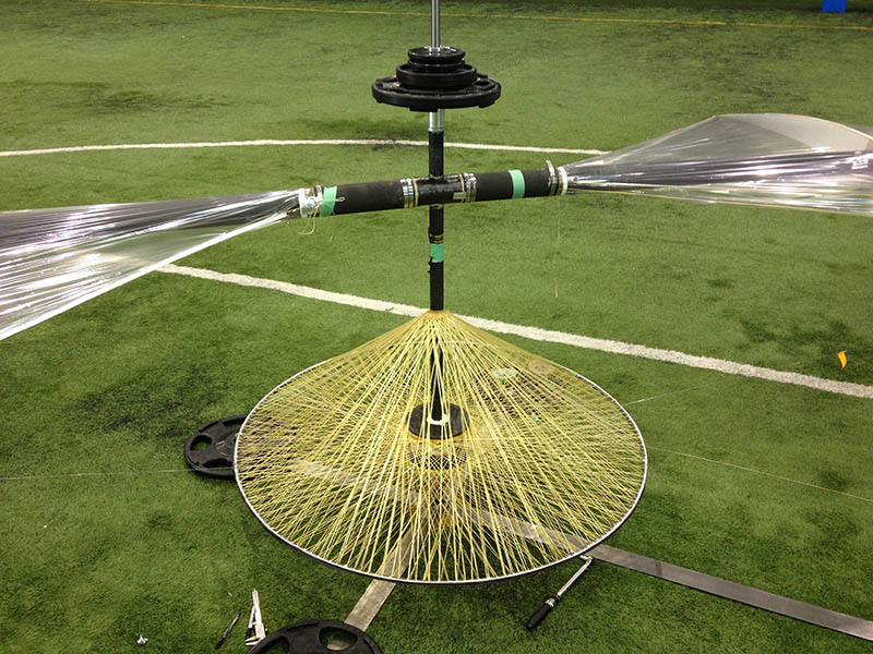 Rotor spool mounted on test stand with ballast masses.