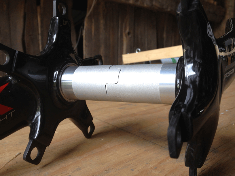 Close-up of machined toothed interface used to join both crank spindles.