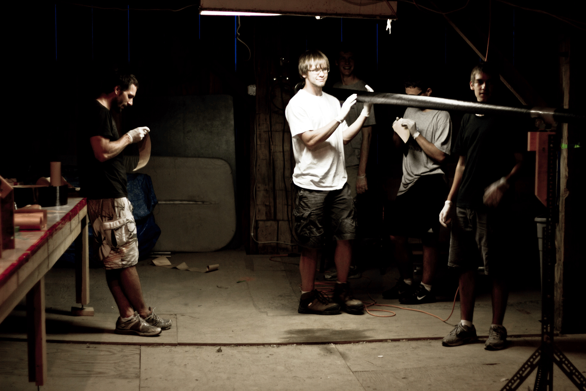 The team manufactures a carbon fiber tube for the rotor late one evening last week.