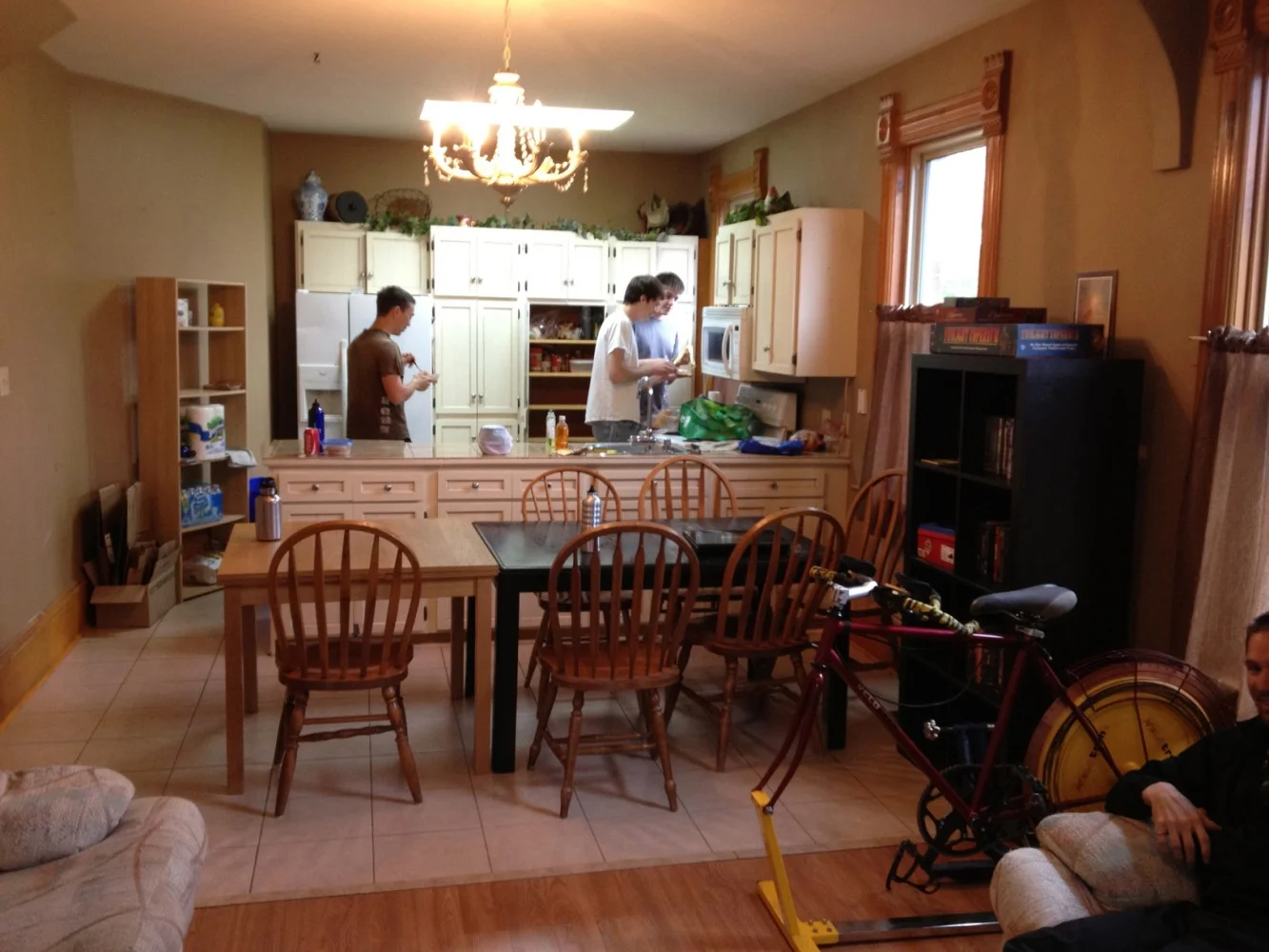 The team is eating breakfast and making lunch for the first day at the barn.
