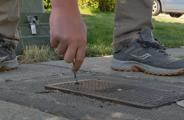 Opening an Outdoor Water Meter Box 