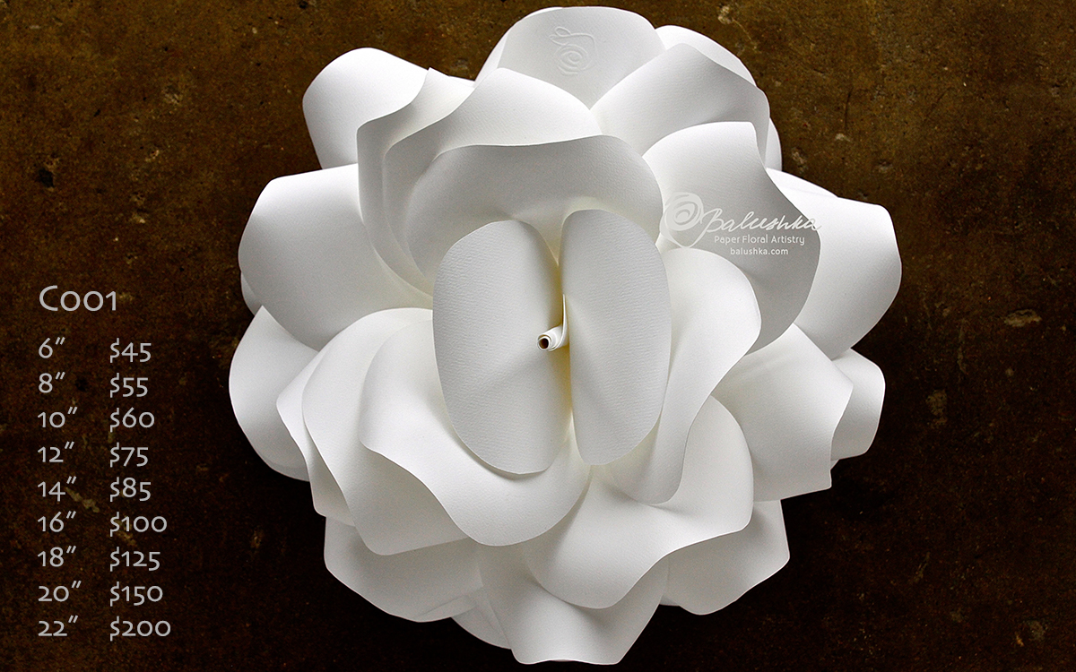 The Camellia, with its three-dimensional look and carefully hand-curled petals is a romantic, classic look and one of the most popular designs. It's the perfect look for home decor and special events. Please also see style C002, which has the same body with a different center option. See the Shop section for a timeless framed flower.