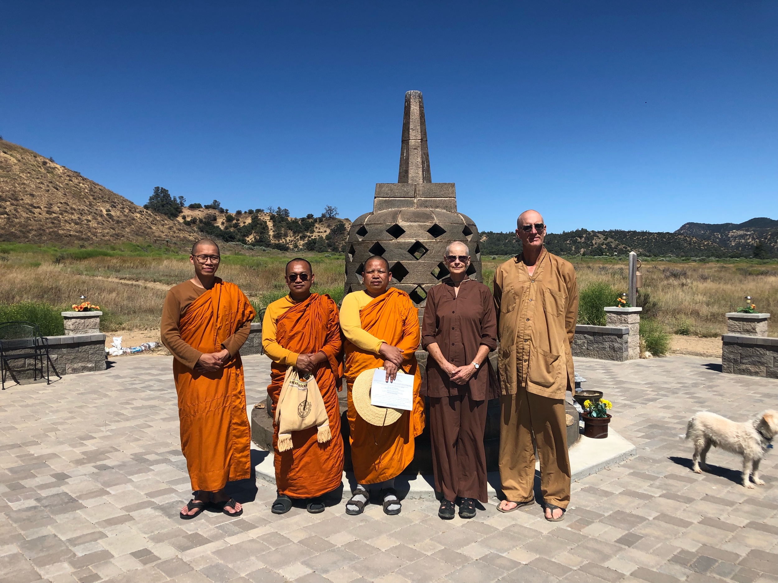 The monks (L-to-R: Ajahn Saran, Ajahn Khamjan and Ajahn Saen) with Zen monk friends Reverend Phoebe and Reverend Seikai during a tour of Pine Mountain Buddhist Temple.