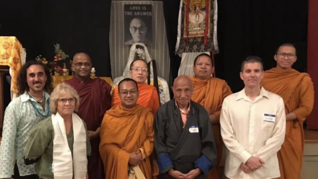 Emiliano, Lauris, Bhante Sutadhara, Ajahn Khamjan, Ajahn Sanguan, Thepo Tulku, Ajahn Saen, Courtney and Ajahn Saran—at the 84th birthday celebration of His Holiness the 14th Dalai Lama.