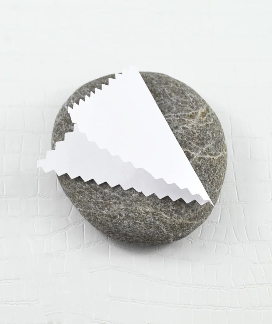 Triangle Paper Fold (I used Pinking Shears here but you can use straight edge scissors. Photo Credit: Michelle Somers