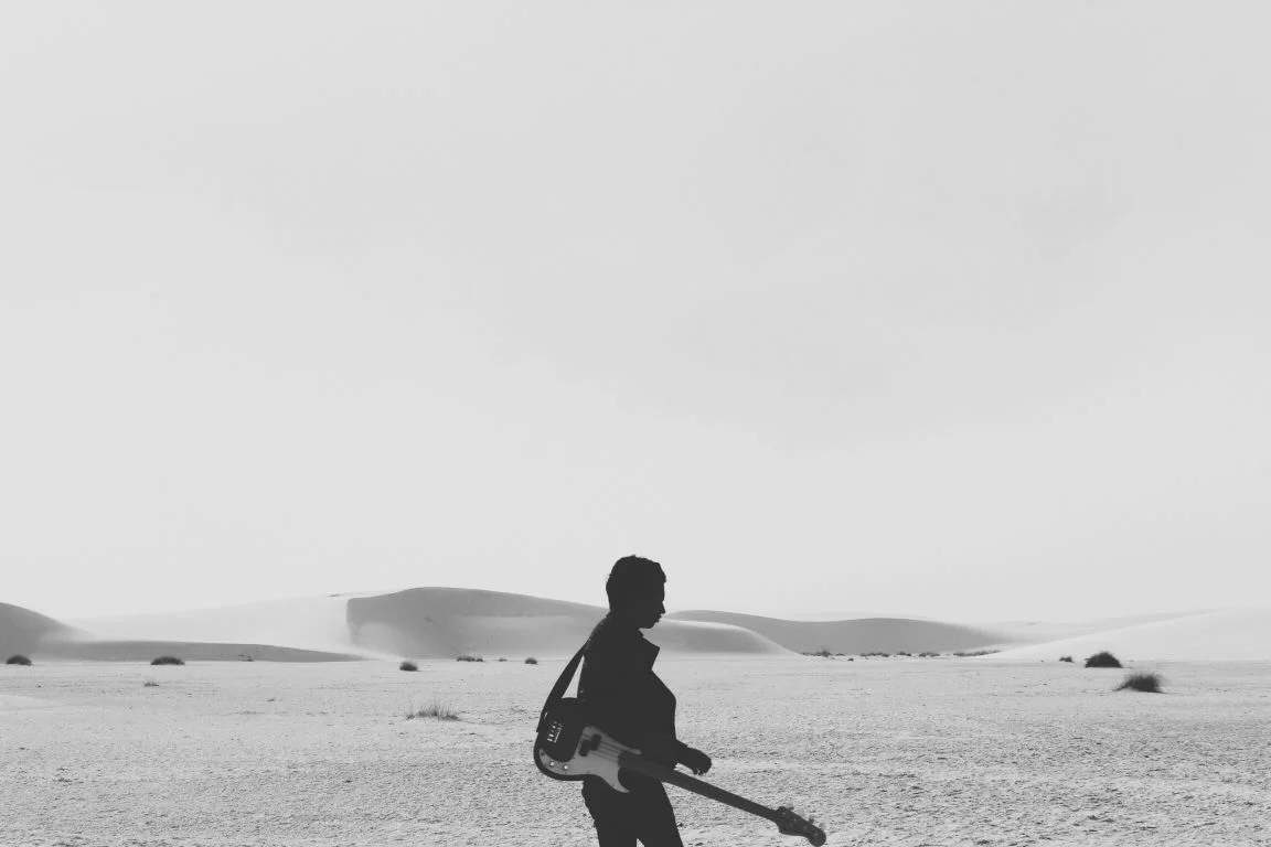 shoptwoblooms man with guitar.jpg