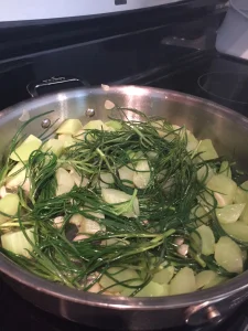 A saute of celtuce, saltwort and young garlic. (Photo credit: Shayna DePersia)