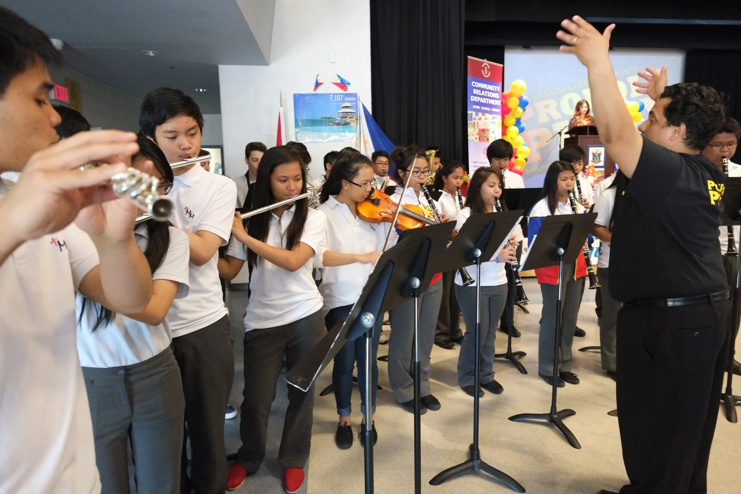 The Marshall McLuhan CSS school band playing the Philippine National Anthem. Photo by JC Bonifacio.