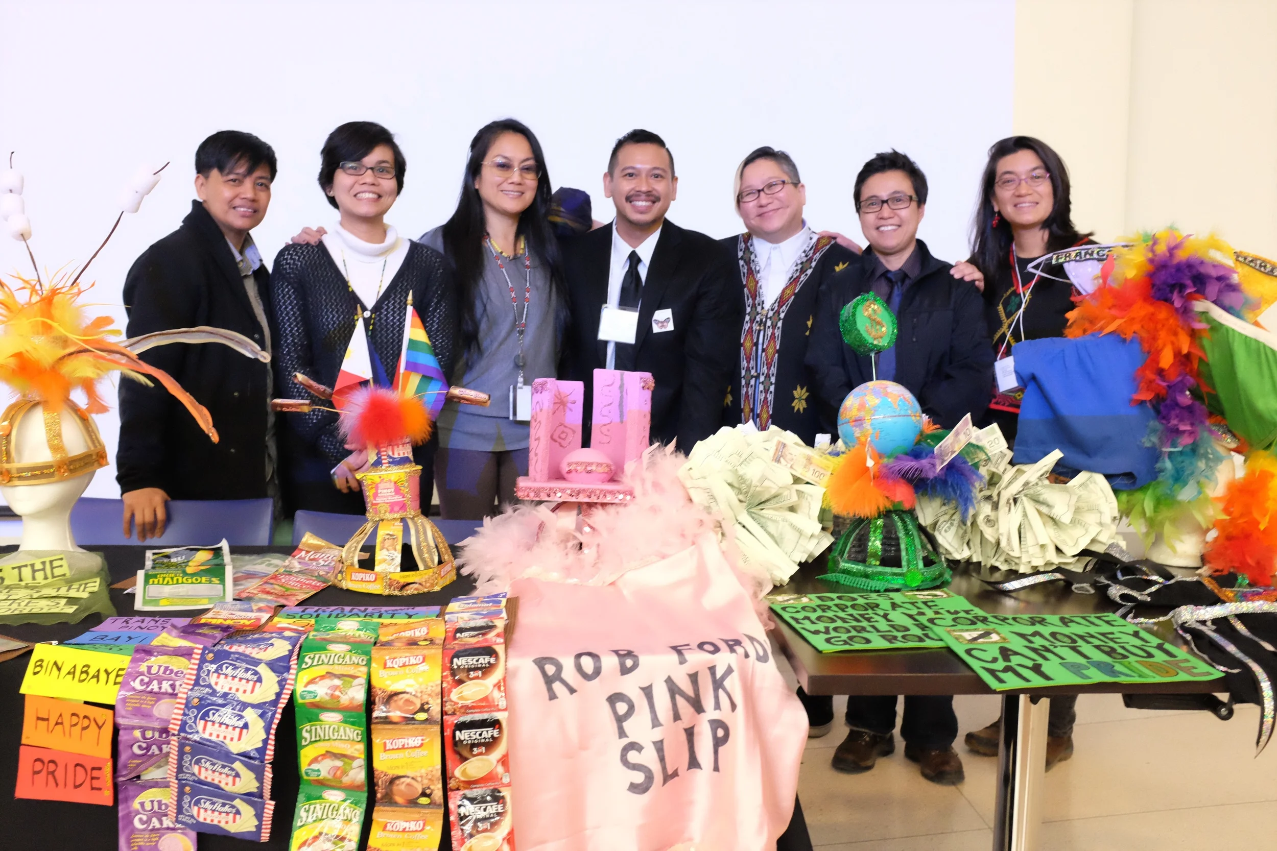 Pj Alafriz, Christine Balmes, Melanya Liwanag Aguila, Robert Diaz, Jo SiMalaya Alcampo, J Rivera, and Lisa Valencia-Svensson with political Pride costumes.