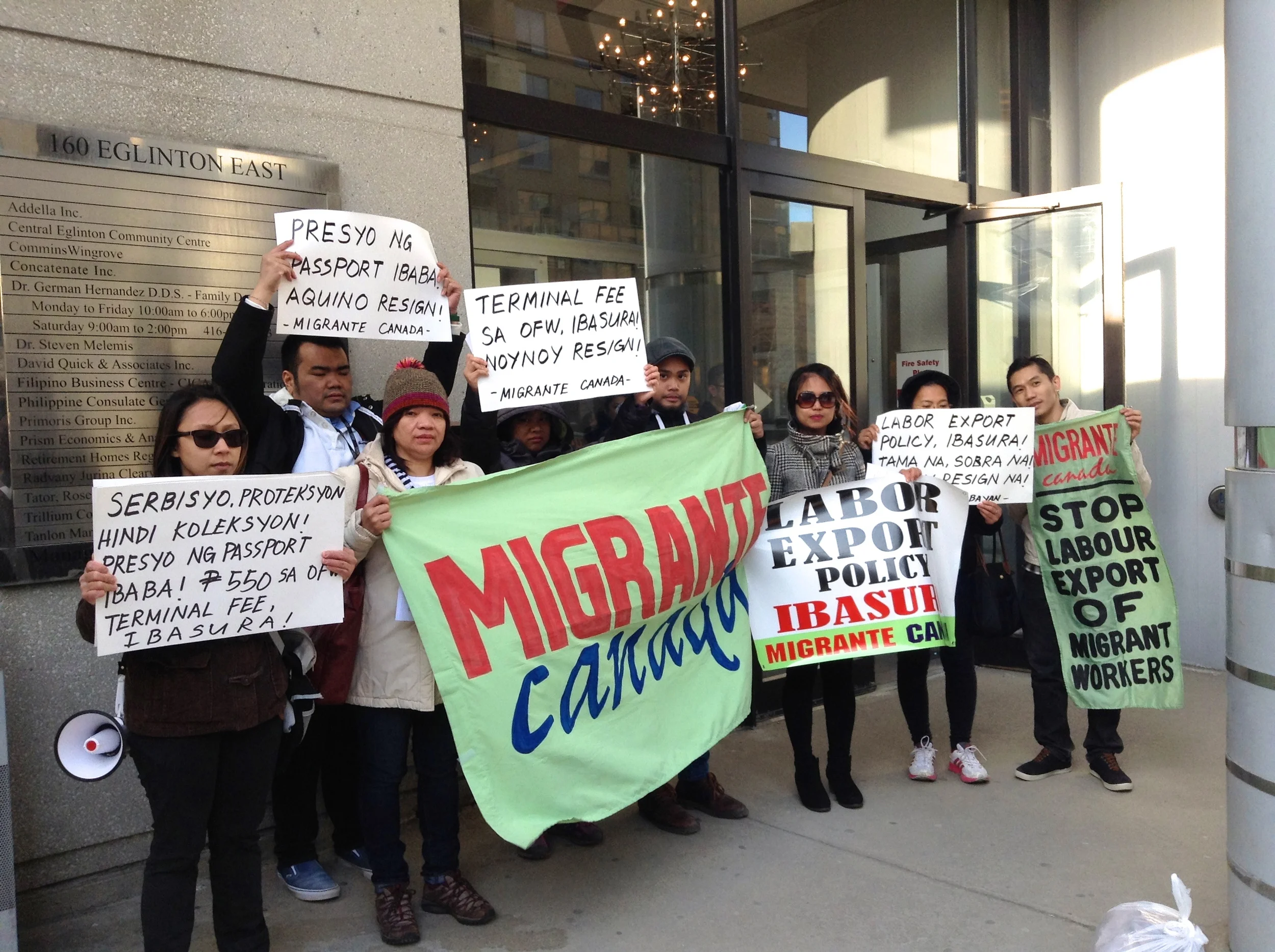 Representatives from Migrante Ontario, iWWorkers, Gabriela Canada, and Anakbayan Toronto rallying outside of the Philippine Consulate.