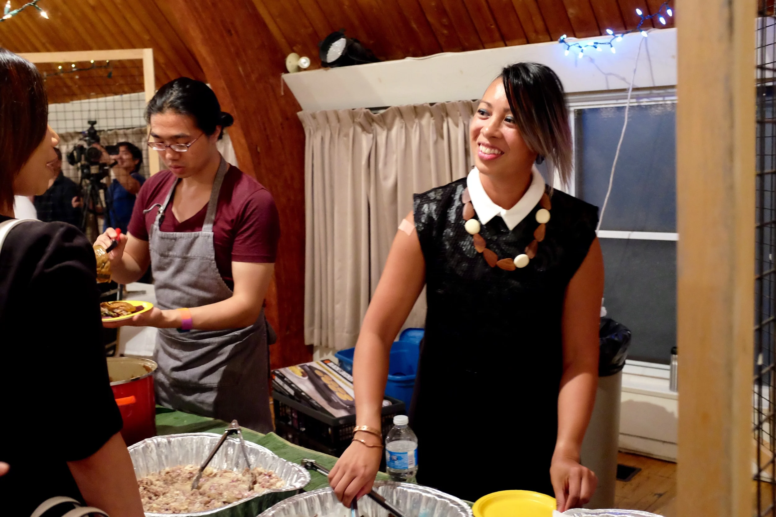 Gilbuena serving kare-kare poutine with ube fries. Photo by JC Bonifacio
