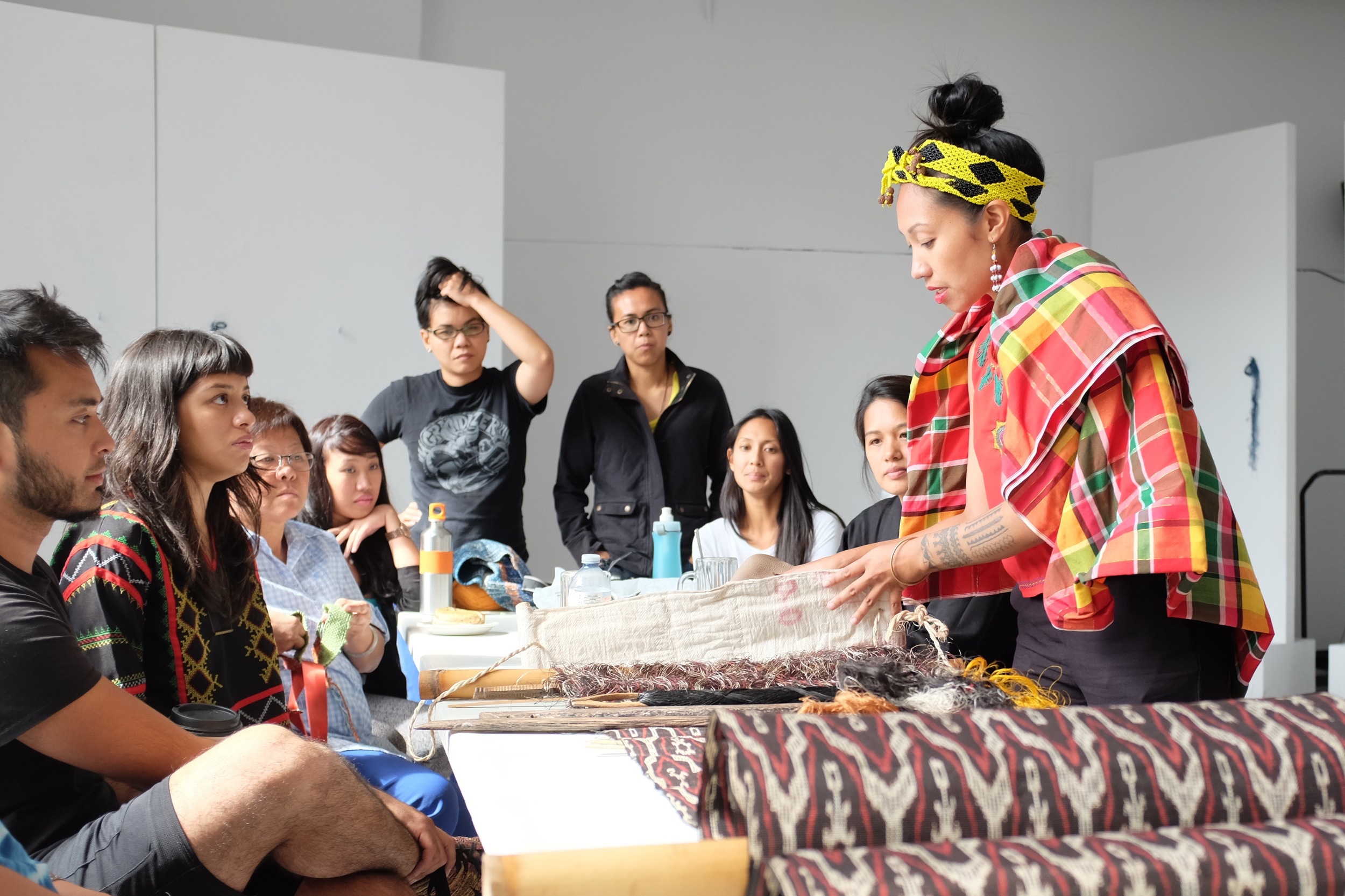 Jennifer Maramba teaching about the T'nalak, a T'boli textile. Photo by J. Austria