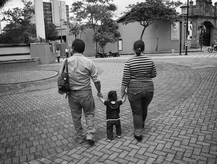 Couple walking with child.jpg