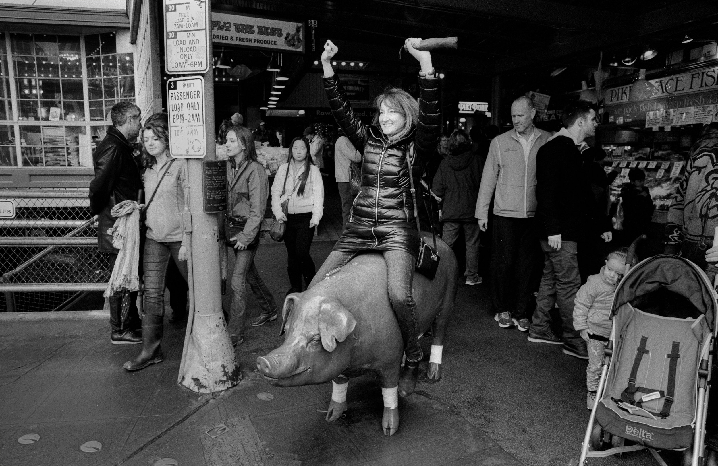 Woman on pig.jpg