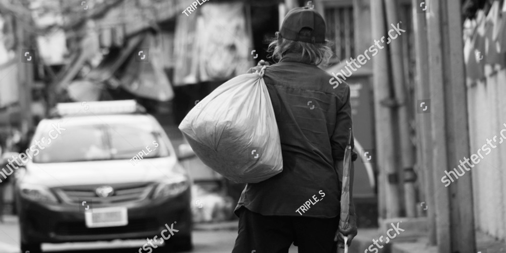 stock-photo-old-man-walking-on-the-street-654635689-web.jpg