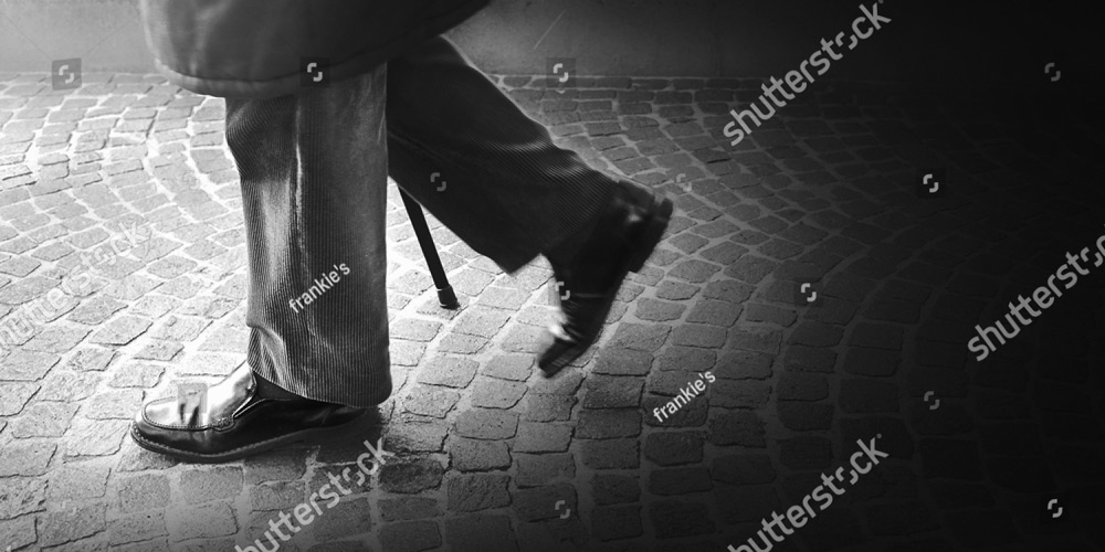 stock-photo-old-man-walking-with-his-stick-toward-light-255160651-web.jpg