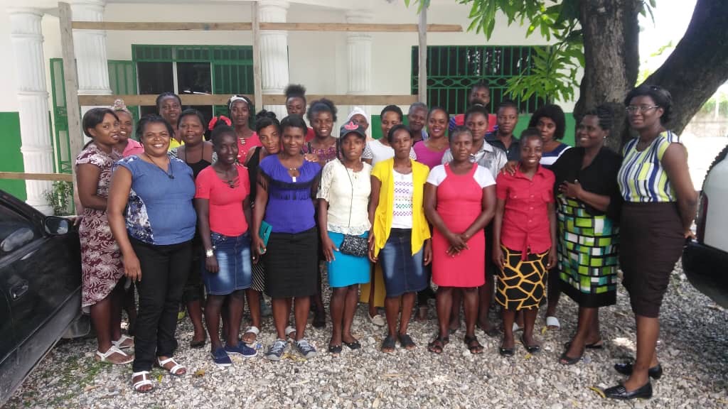 A group of our monitrices with Rose Elene (third from left) and Nurse Martha and Nurse Guirlene (right) of the MOH